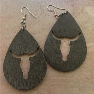 Reversible cow skull earrings